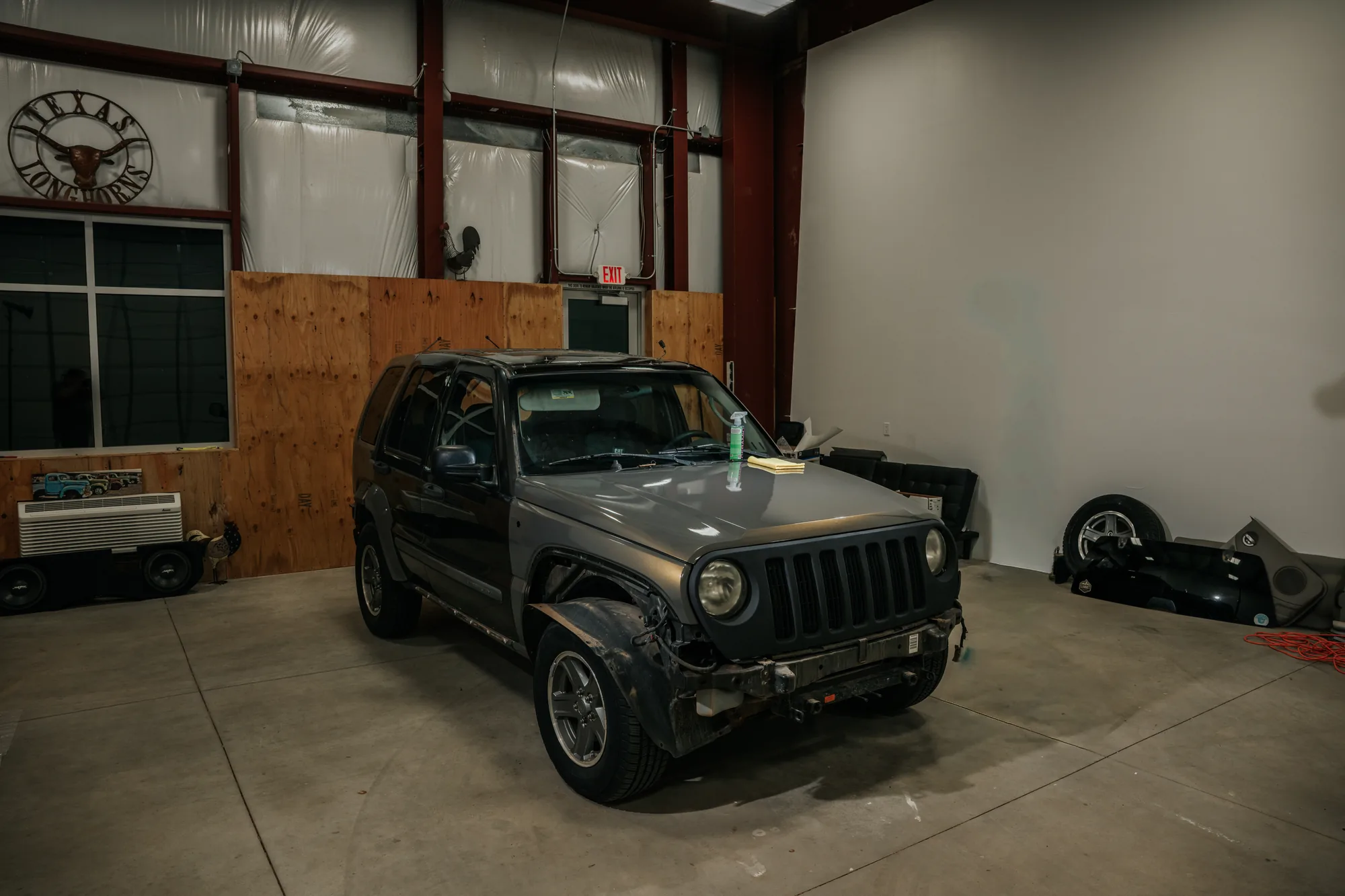 A Jeep parked in the enclosed install bay at 928 Tint in Prescott Valley