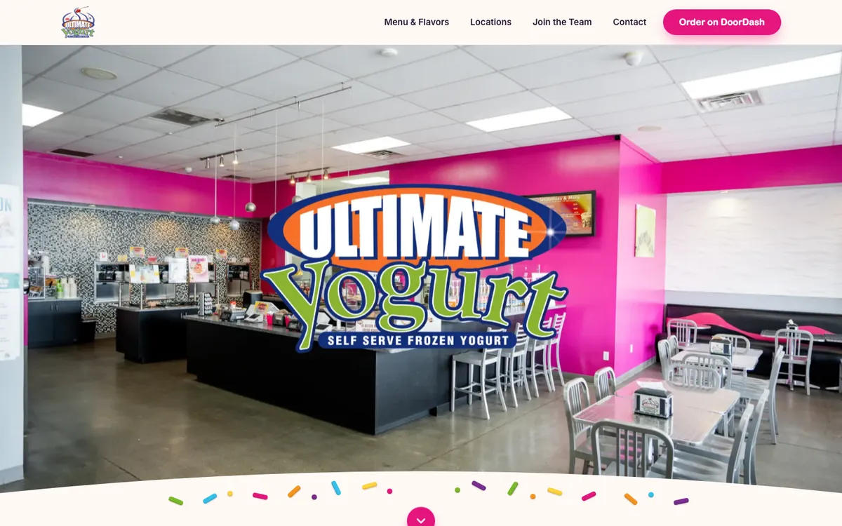 Ultimate Yogurt homepage showing the shop interior with a bright pink wall