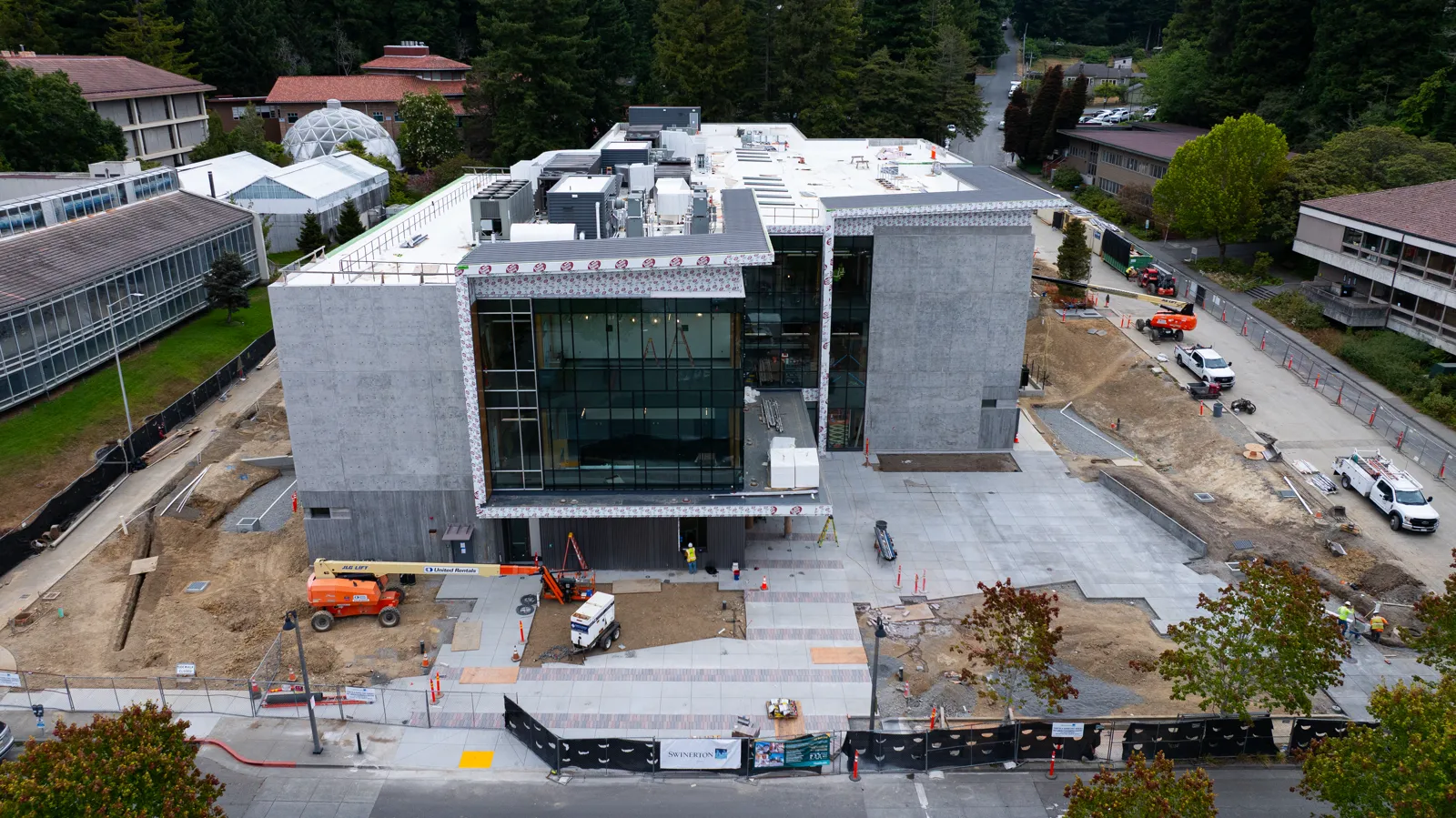 Front elevation drone aerial of an academic building nearing completion. Drone Photography and Videography by Tex Kelly Productions, serving Williams, Arizona.