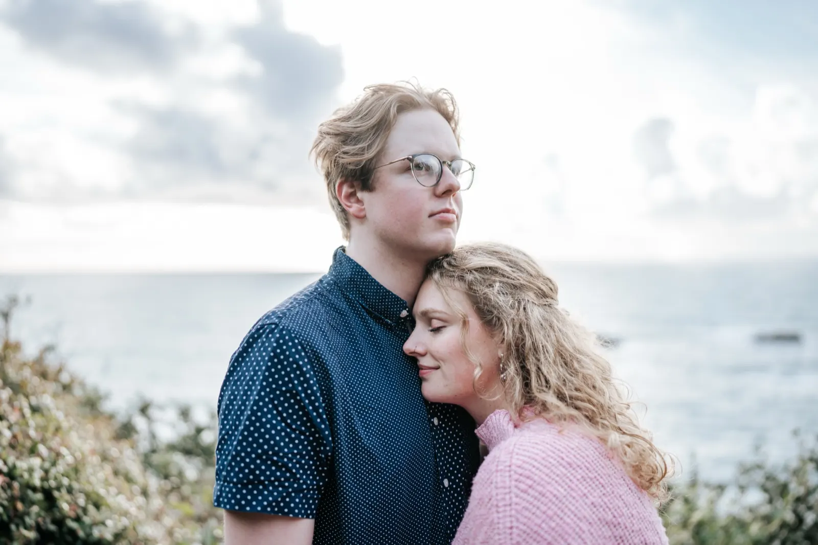 Alex and Amilie laughing during their engagement session