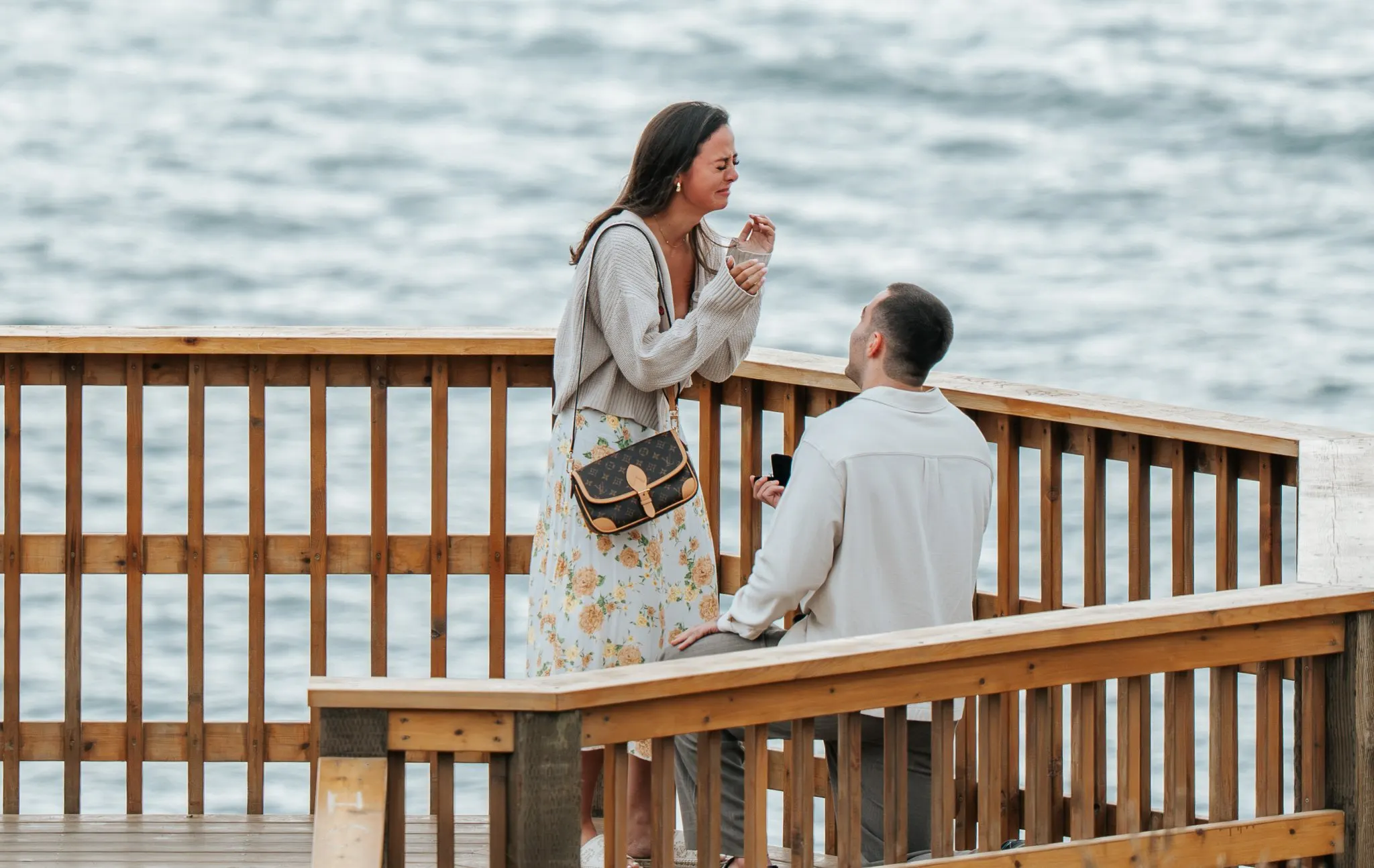 Surprise proposal candid, the moment the cover story ends, hand-to-mouth reaction