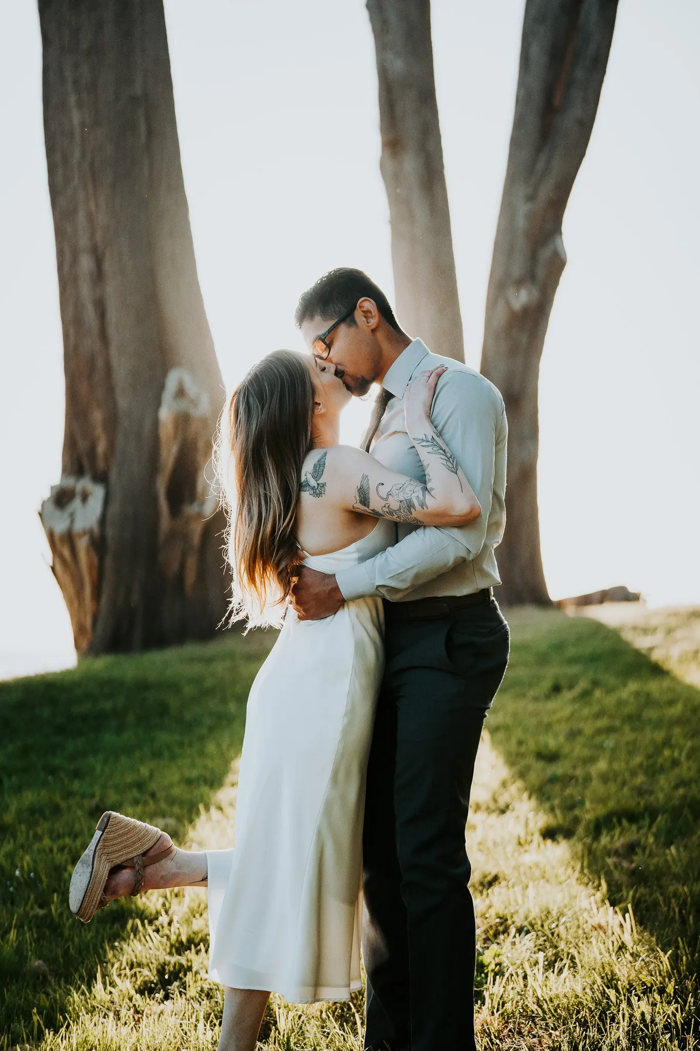 Couple in the Arcata Community Forest at filtered light