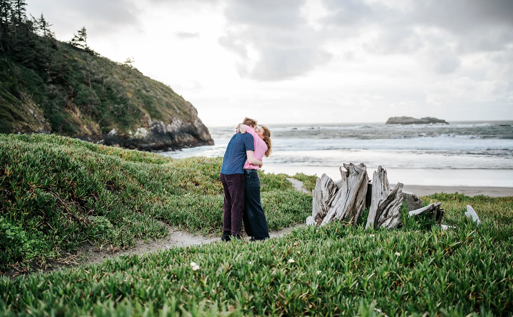 Couple captured mid-laugh during their engagement session
