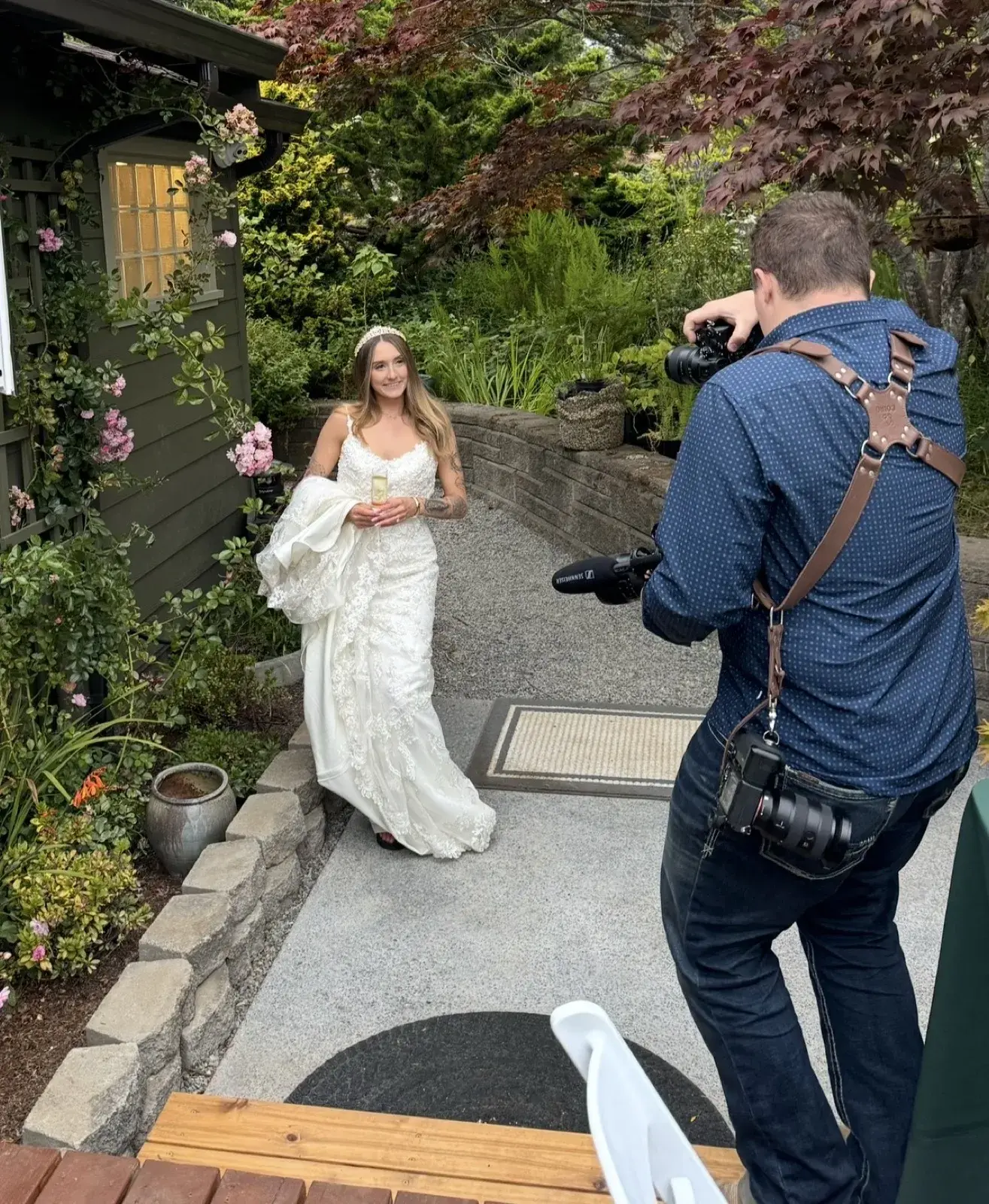 Tex Kelly filming a bride on location with a cinema camera and a shotgun microphone