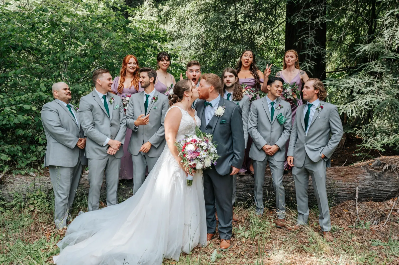 Kendra and Gannon, full wedding party portrait in a redwood grove