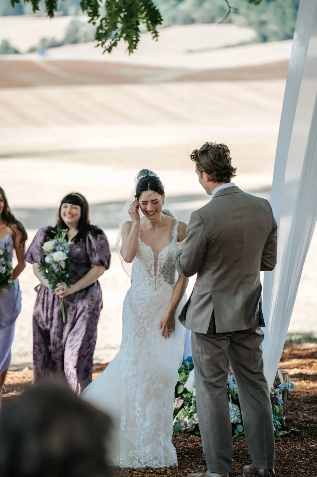 Bride greeted by guests at an outdoor ceremony. McKinleyville wedding photographer