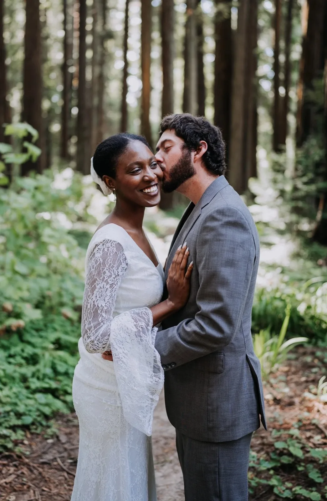 Wedding moment in an old-growth redwood grove. Humboldt County wedding photography
