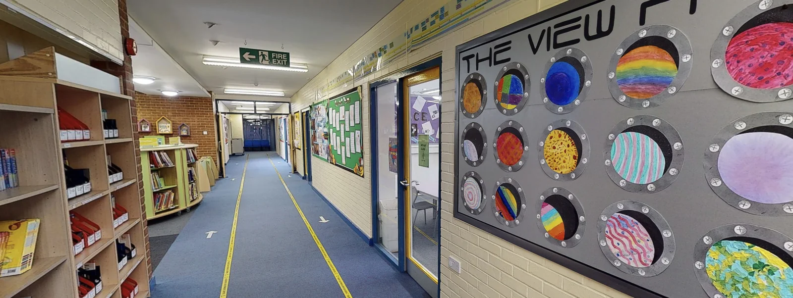 Public school hallway with student artwork display, captured as an immersive 3D walkthrough (photo via Matterport partner materials)